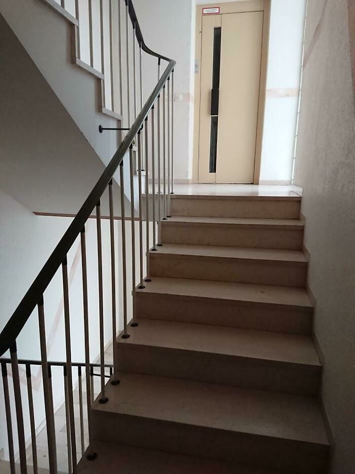 The Lift In This Building Is On Every Alternate Half-Level From Where The Doors To The Houses Are