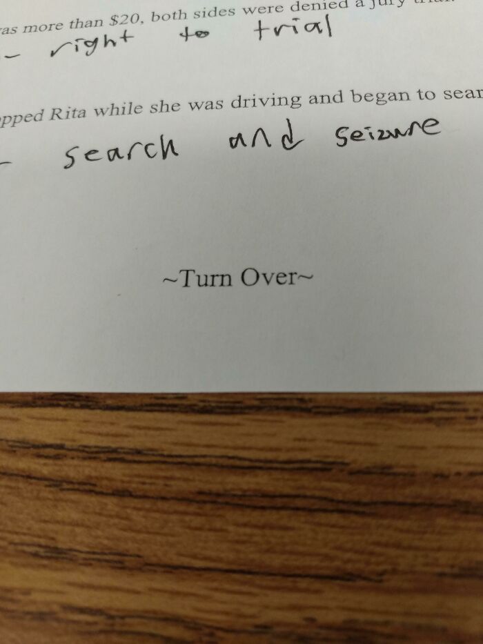 Civics Teacher Adding Extra Line So Students Don't Miss The Backside