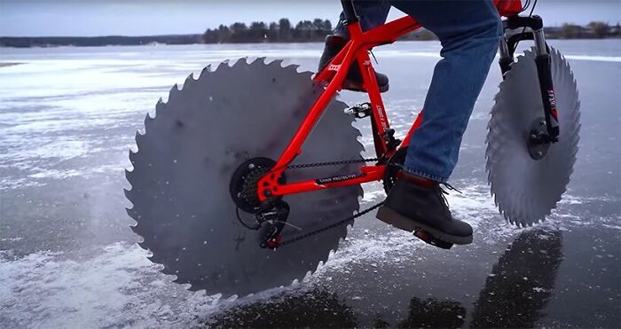 Man Replaces Bike Tires With Circular Saws And Goes For A Spin On A Frozen Lake Man Replaces Bike Tires With Circular Saws And Goes For A Spin On A Frozen Lake