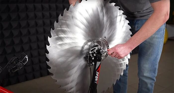 Man Replaces Bike Tires With Circular Saws And Goes For A Spin On A Frozen Lake Man Replaces Bike Tires With Circular Saws And Goes For A Spin On A Frozen Lake