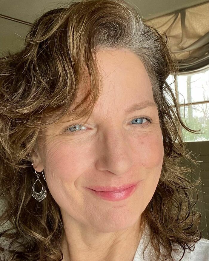 “My Mom Didn’t Dye Her White Hair And Chose To Go Natural
— Though Cost And Time Was Likely A Factor As She Had A Full Time Job As A Nurse’s Aide And Five Kids To Support. As A Teen I Really Wanted Her To Dye Her Hair. I Didn’t Want Her To Be Different. I Witnessed How Some Women Treated My Mom Like She Was Old— When Oftentimes She Was Younger, Stronger, Fitter, Smarter— And Had Been Blessed With A Beautiful Complexion As Well As A Kind Heart. When My Mom Reached Her Fifties — She Said She Felt Happier And More Confident With Herself And With Her Life. Ironically, When I Tried Going Naturally Gray In My Early 50s — Mom Wanted Me To Dye My Hair Again. I Think It Was Hard To See Her Adult Daughter Aging And She Didn’t Want Me To Deal With Negative Comments From Other Women. A Couple Years Before She Died She Told Me The Sad Story That Many Women Friends That Were In Their 70s & 80s Told Her They Were ‘Afraid’ To Grow Out Their Hair Because They’d Look ‘Old.’ My Mom Died Two Years Ago And Though I Am Now 56— I’m Still Not Sure She’d Like Me Going Natural— But Here Goes Mom :) Thankfully, My Own 16 Year Old Daughter Is Much More Supportive Than I Was As A Teen And Likes My Silver-Gray. The Last Time I Tried Going Natural — I Cut Off All My Hair To About An Inch Or Two From The Scalp — Then A Few Months Later I Highlighted (Mistake: My Hair Went Yellow Even With Purple Shampoo). This Time I Layered My Hair Which So Far Is Working Better As I Do Not Have The Features To Pull Off A Drastic Pixie. Fingers Crossed As I Finally Grow Out My Hair To Reveal My True Hair Color. Patience Is Key.” @writertrisha #grombre #gogrombre #grombabe