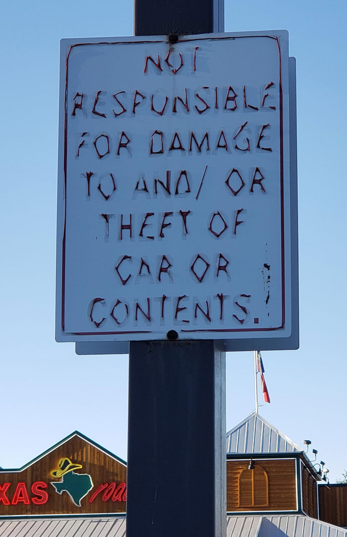 This Well Worn Parking Sign