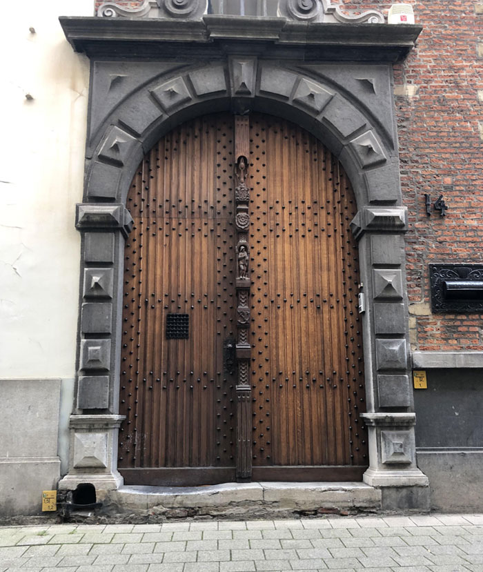 A Door Step In Antwerp That Is Deformed After Many Years Of Use