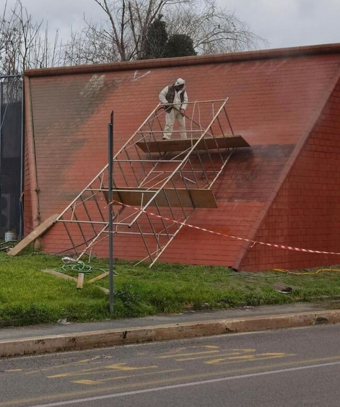 Cleaning A Metro Station In Rome On A Slippery Slope
