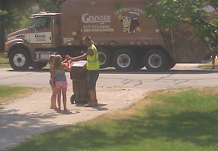 It's 103+ Out, So My Daughter And Niece Waited For Our Garbage Men To Come By So They Could Run Out And Give Them Some Ice Cold Gatorades