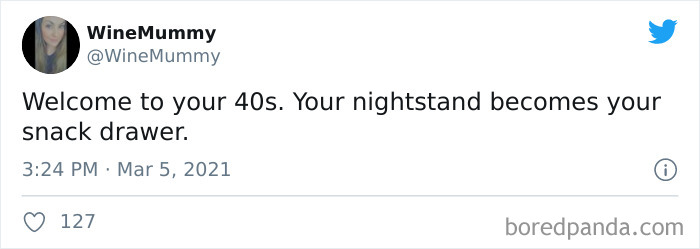 Tweet about life in your 40s humorously describing a nightstand as a snack drawer.