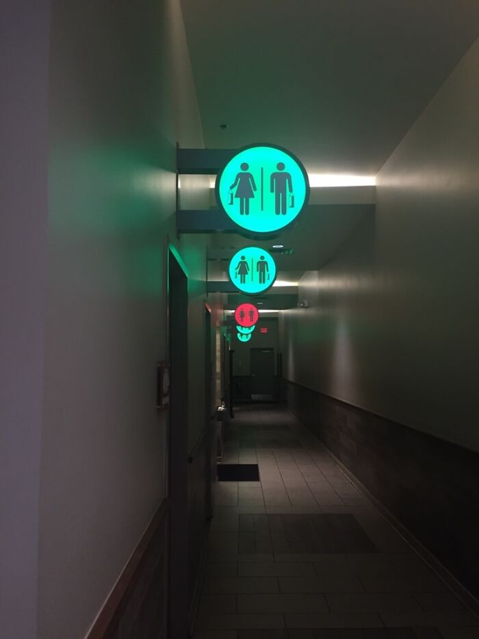 These Signs Tell You Whether Or Not Each Restroom Is Occupied