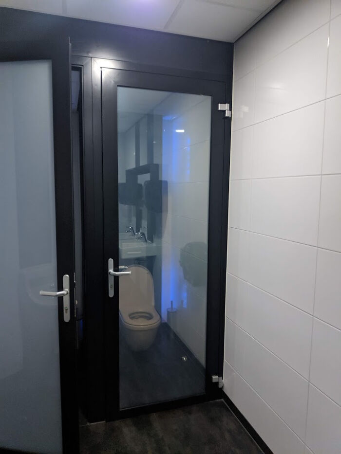 This Restroom I Visited Has "Electro Chromic Glass", Which Is Transparent When Unlocked, And Turns Matt When Locked