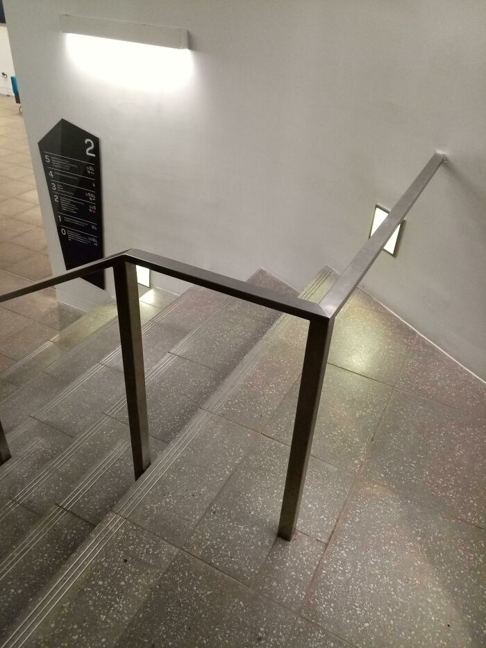 One Half Of The Stairs Has A Bar Across The Path For No Apparent Reason