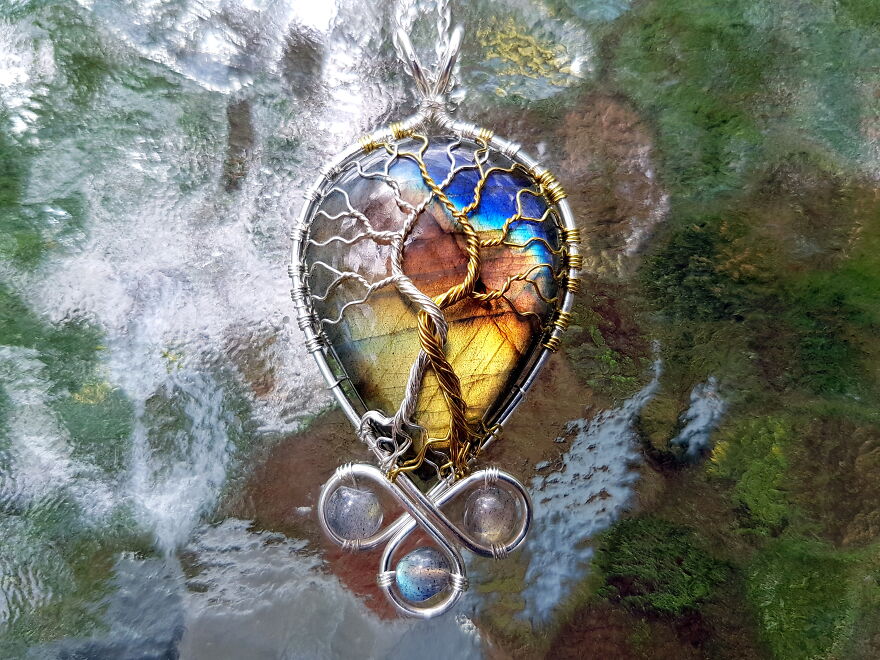 A Pendant Made With A Labradorite Gemstone And Labradorite Beads