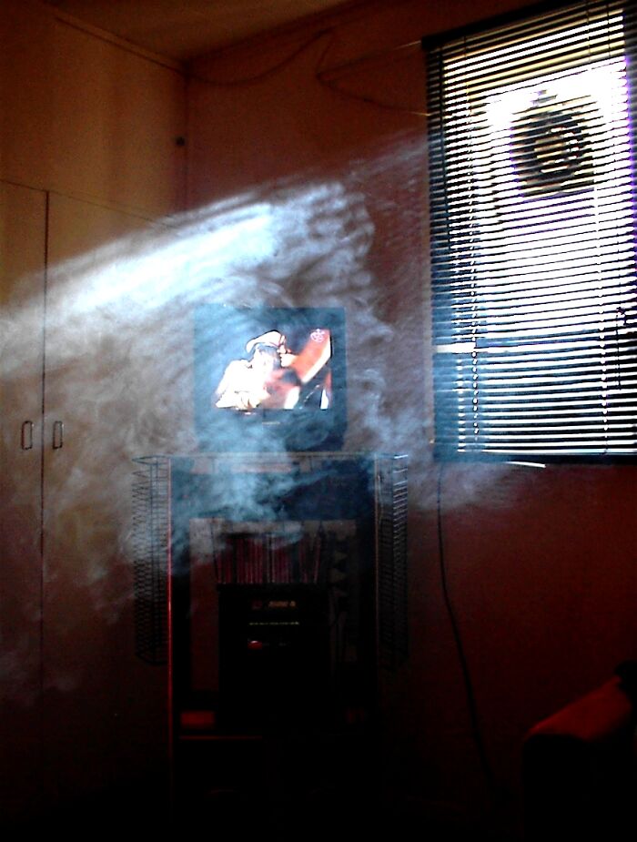 Face In The Smoke Looking Towards The Window