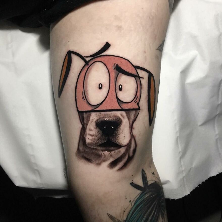 Tattoo on a leg merging cartoon and realistic styles, featuring a dog's face with expressive eyes and ears.