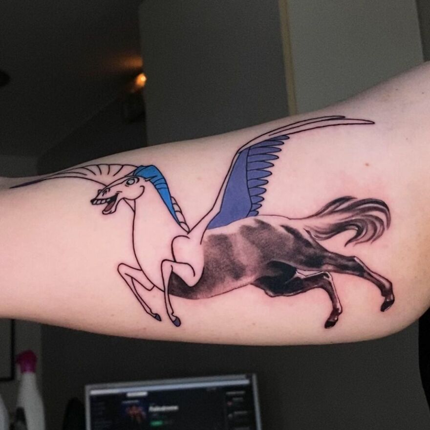 Tattoo of a Pegasus on an arm, combining two art styles by artist Mat Rule.