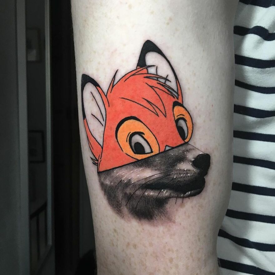Fox tattoo combining cartoon and realistic styles on arm.