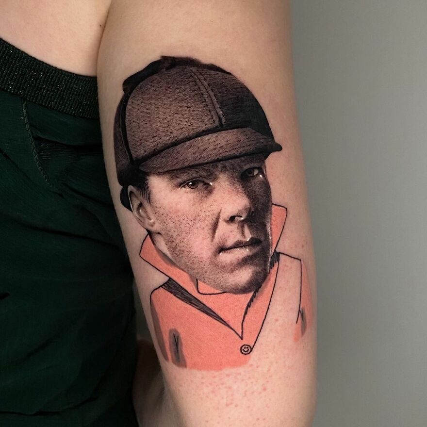 Tattoo on arm combining two different styles by Mat Rule, featuring a person in a cap and colored jacket.