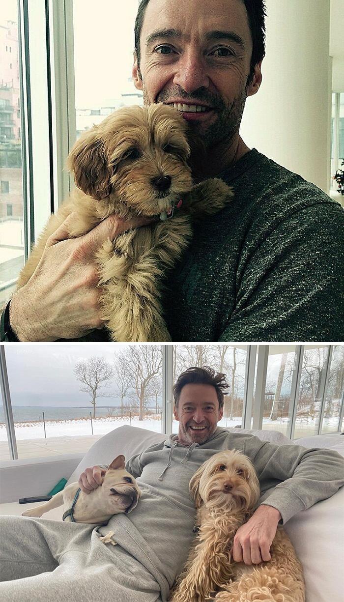 Celebrity holding and cuddling dogs indoors, showcasing their immense love for dogs in a cozy home setting.
