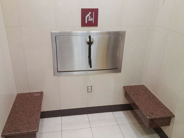 Brilliant. This Bathroom Has A Place For The Other Kids To Sit While You Change The Baby