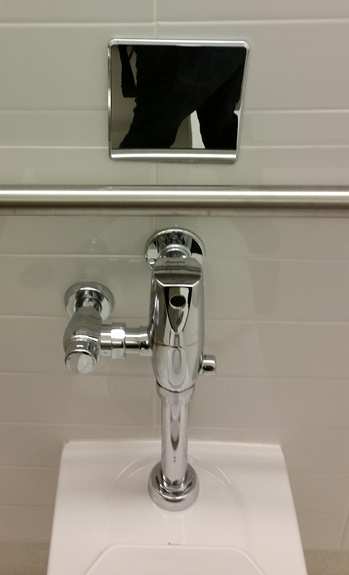 This Bathroom Stall Has A Tiny Mirror So You Can Check Yourself After Wiping