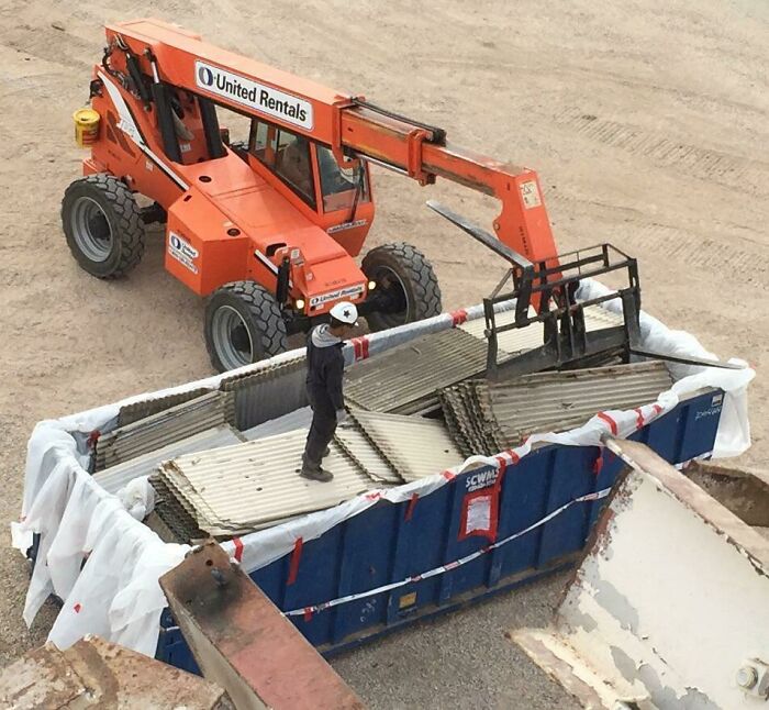 Suits And Respirators *should* Be Worn At All Times During Asbestos Removal. Also Breaking Up The Friable Material Is Not Recommended
