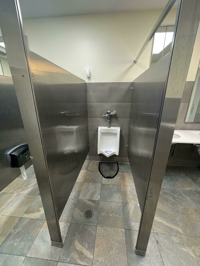 This Urinal With Actual Walls Next To It