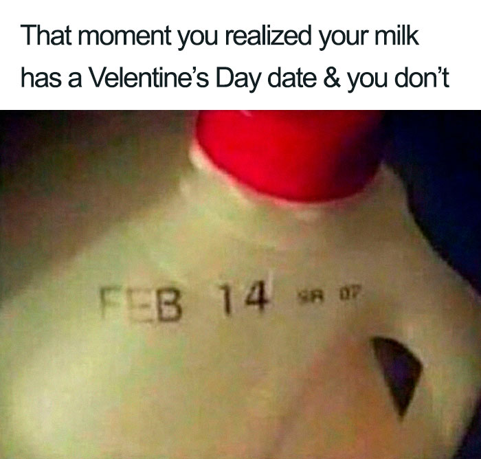 Milk jug with February 14 expiration date, highlighting the humor of being single.