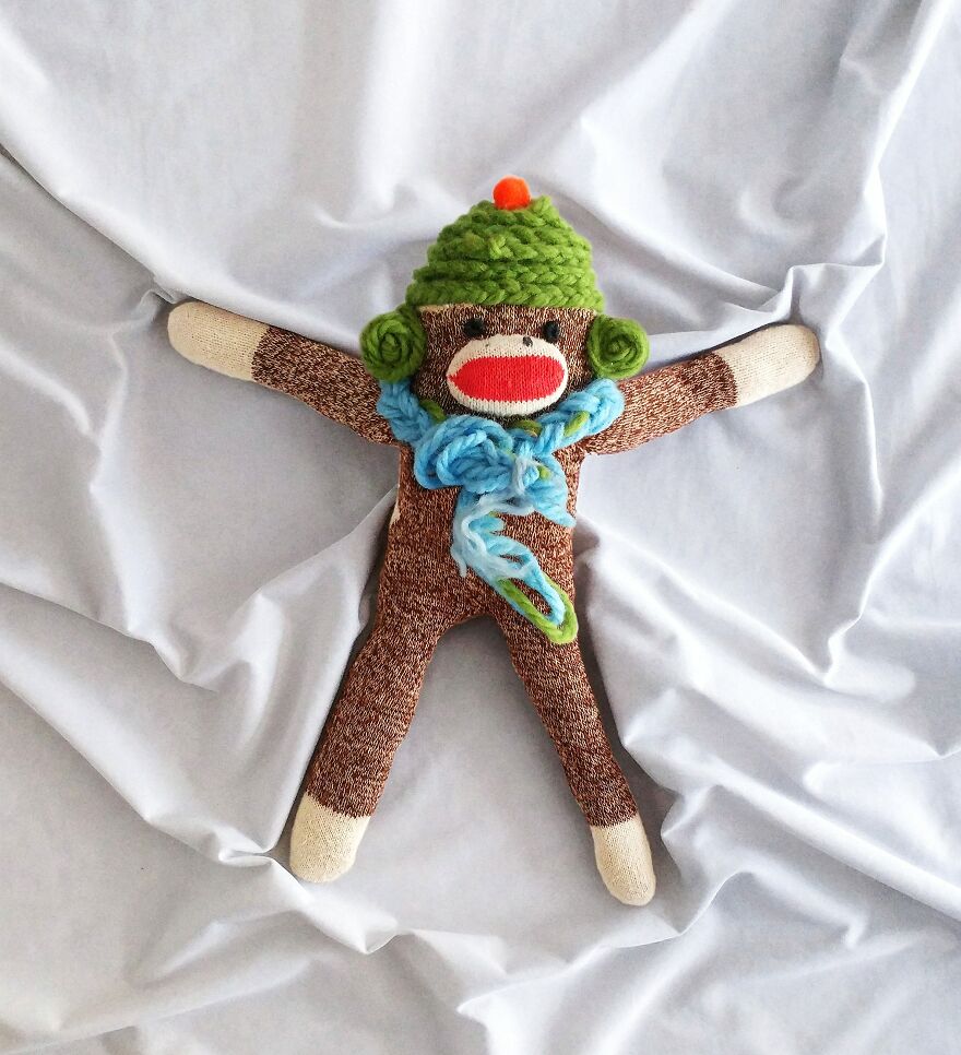 Since Covid Began, I Have Tried To Make My Wife Laugh Every Day By Creating Amusing Situations With A Sock Monkey. Here Are 40.