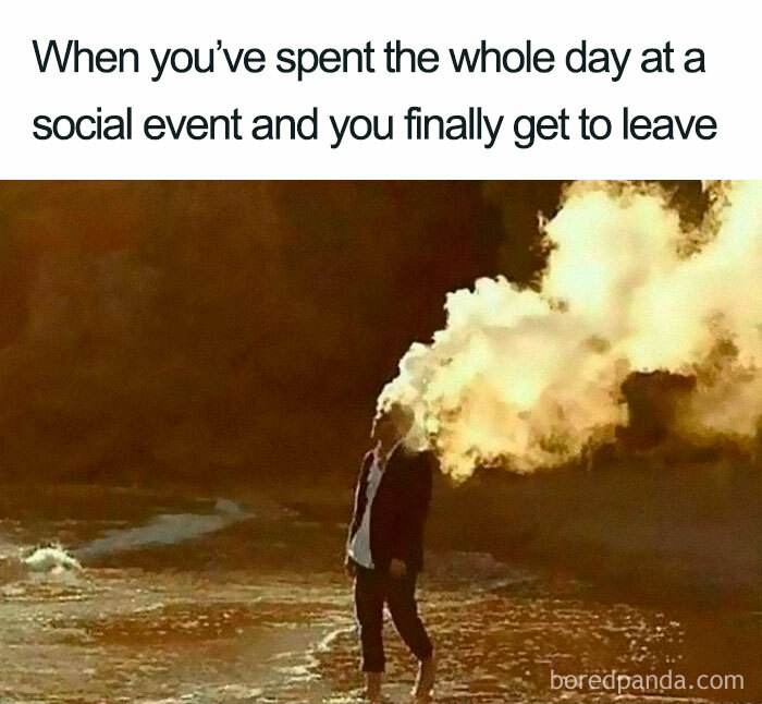Person standing near water with cloud of smoke around head, representing relief in funny introvert memes about social events.