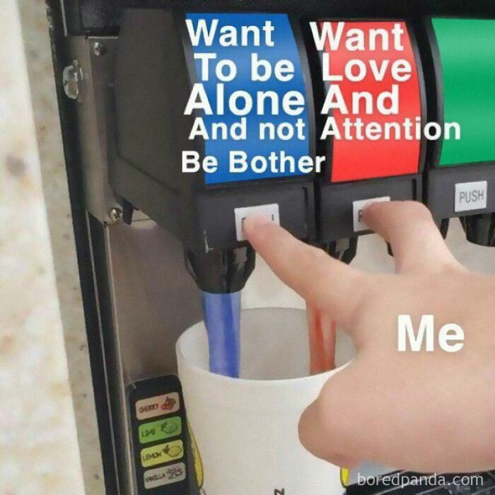 Hand pressing two soda dispenser buttons labeled to show conflicting desires, illustrating introvert memes humorously.