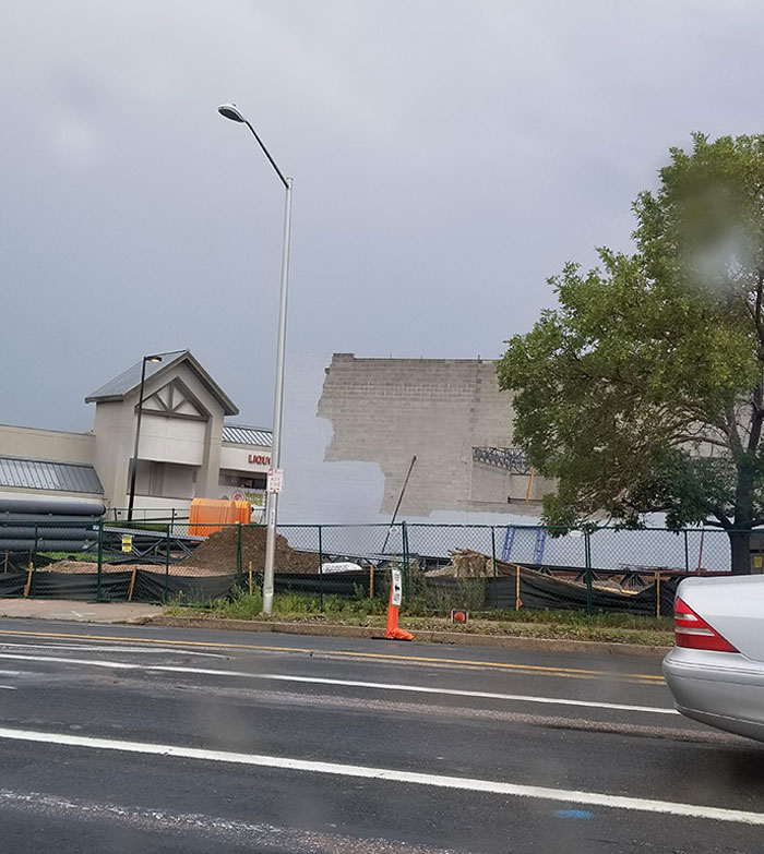 The Paint On This Building Is The Same Shade As The Sky