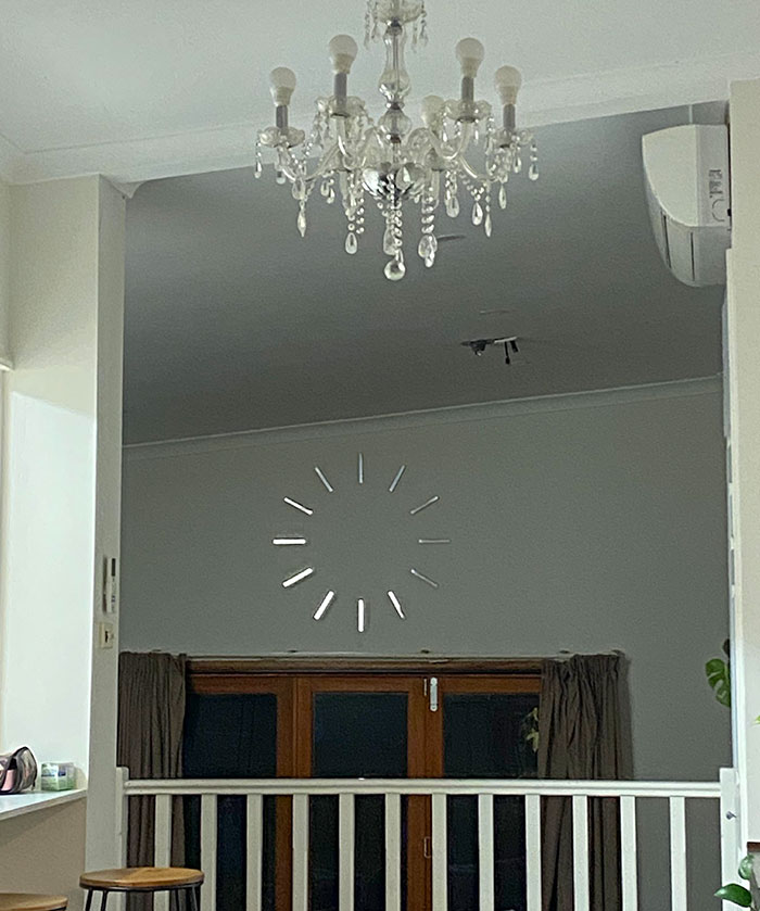 My (Handless) Clock Makes It Look Like The Wall Is Buffering