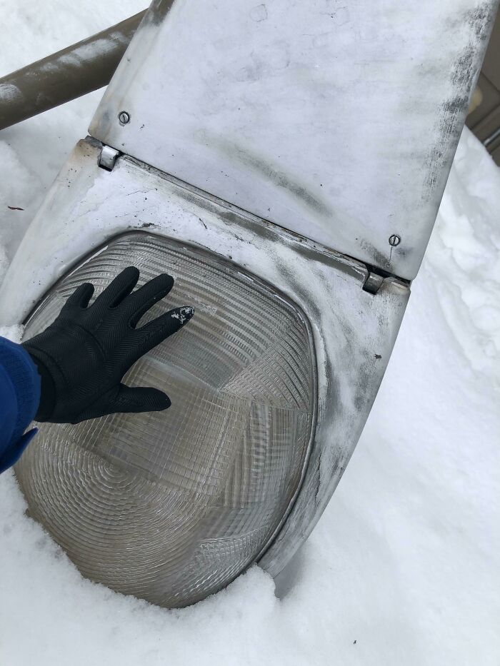 A Street Lamp Fell Over Into The Snow Outside My Apartment. Turns Out They’re Massive - My Hand For Scale