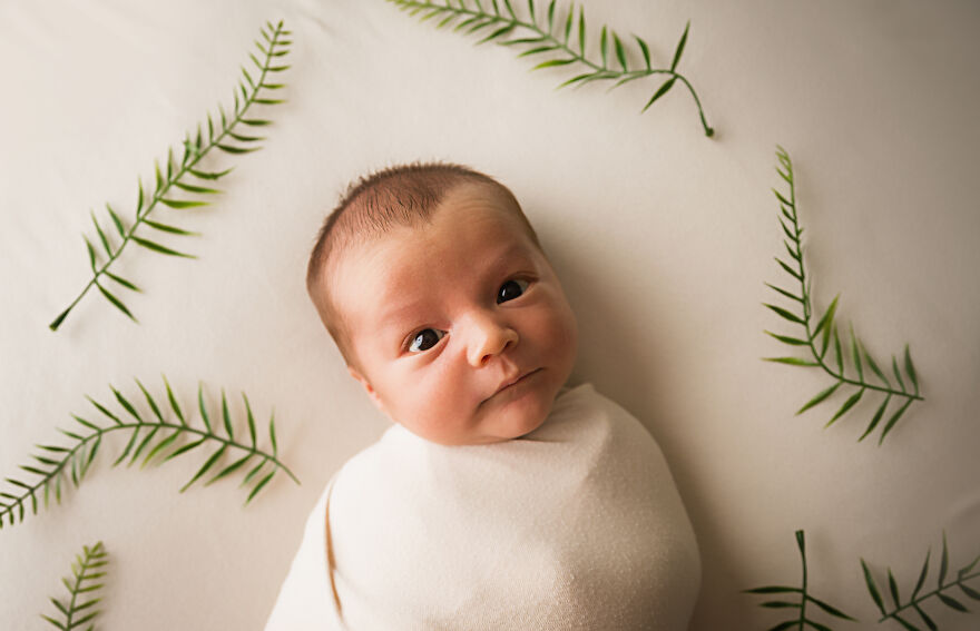 Sweet 10 Day Old Little Boy Looking Up At The Camera