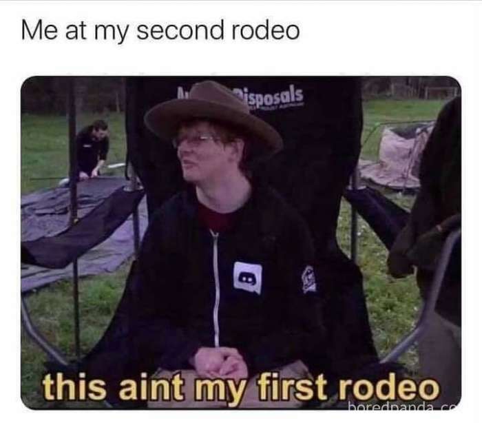 Person wearing a hat at an outdoor event with text overlay "Me at my second rodeo; this ain't my first rodeo," referencing literal memes.