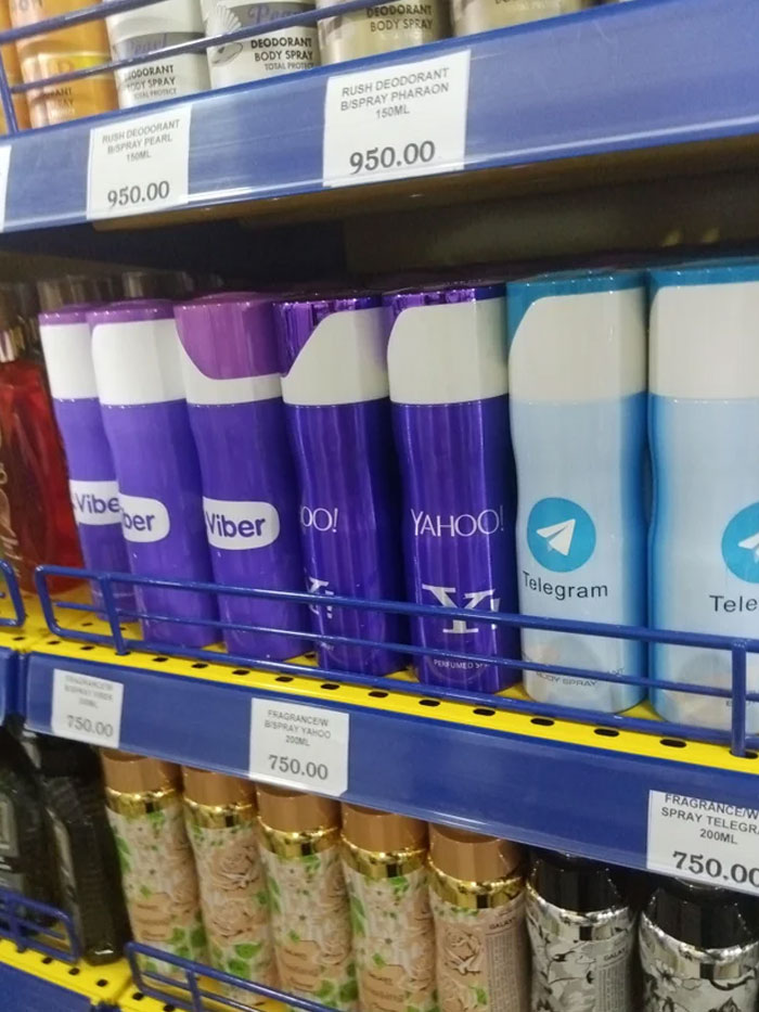 Knockoff deodorant brands displayed on a store shelf, labeled as Viber, Yahoo, and Telegram.