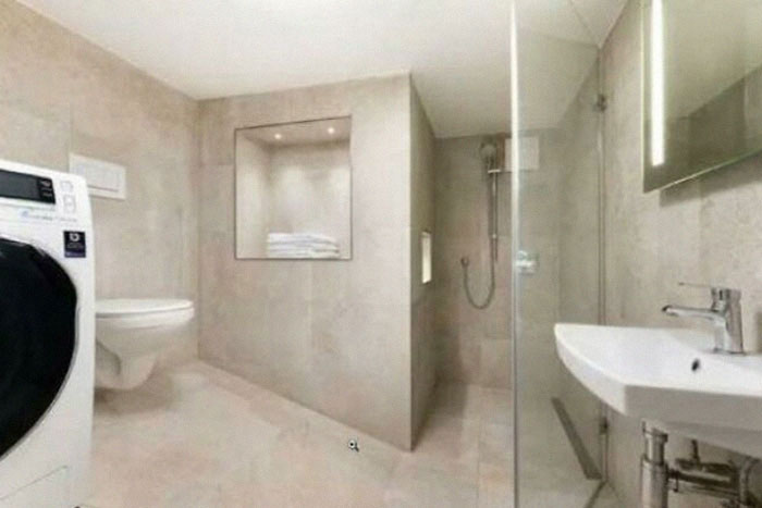 This Apartment In Munich (Price Around 500000$) Has A Sloping Floor Because It's Right Above The Underground Garage