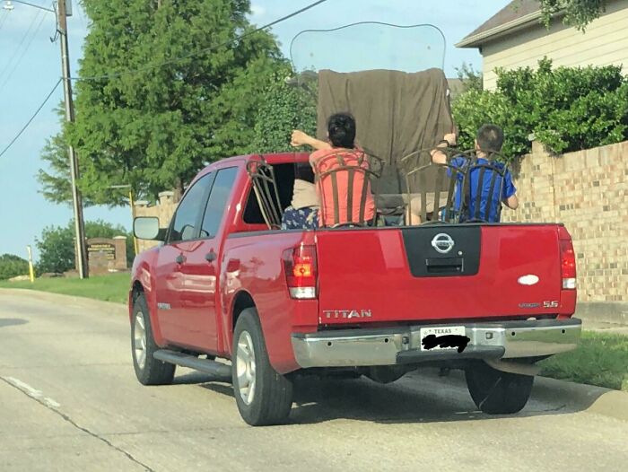 They Had Their 12-15yo Boys In The Bed Of The Truck, Sitting On Dining Room Chairs, Holding Their New Glass Dining Room Table Facing The Wind For Maximum Drag On A 6 Lane Blvd