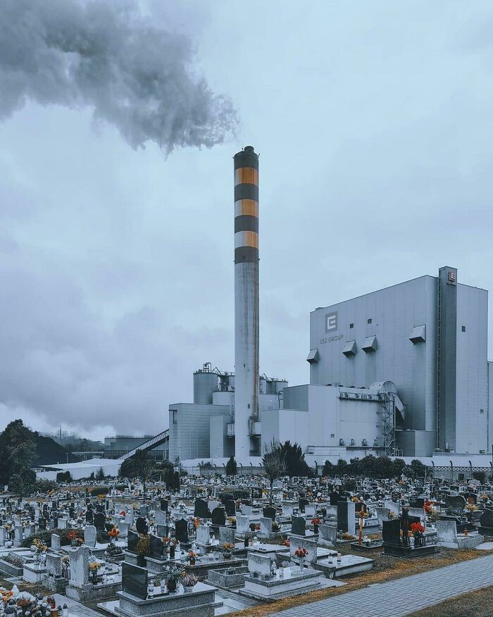 A Cemetery Next To A Factory In Poland