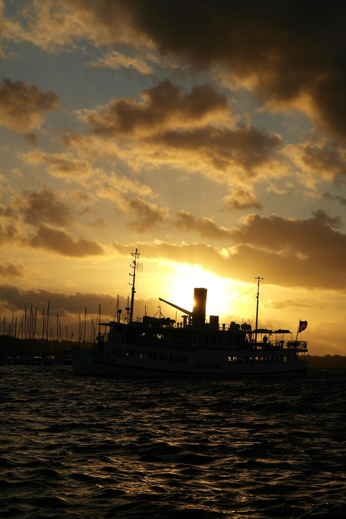 Sunset At Roskilde Fjord. The Boat Is A Sailing Restaurant.