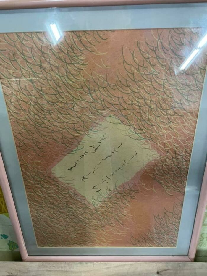 I Spent A While At The St Vinnies Tacoma, Wa Us Yesterday, And Much Of It Was Trying To Figure This Out? Is It Language? Writing? A Tattoo? If It’s A Tattoo Is That Chest Hair? Truly Crappy And Framed In The Colors Of Skin