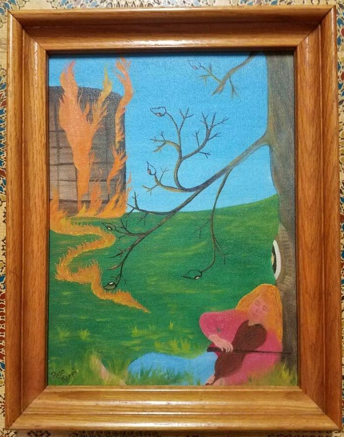 What's With The Burning Shed While The Guy Fiddles Around And The Eye On The Tree, Henry Cole Would Be Saddened By The Burning Shed. Says On Back "The Fiddling Hippie", $2.99 At Chehalis, Wa. Thrift Store. And Yes I Bought It Home