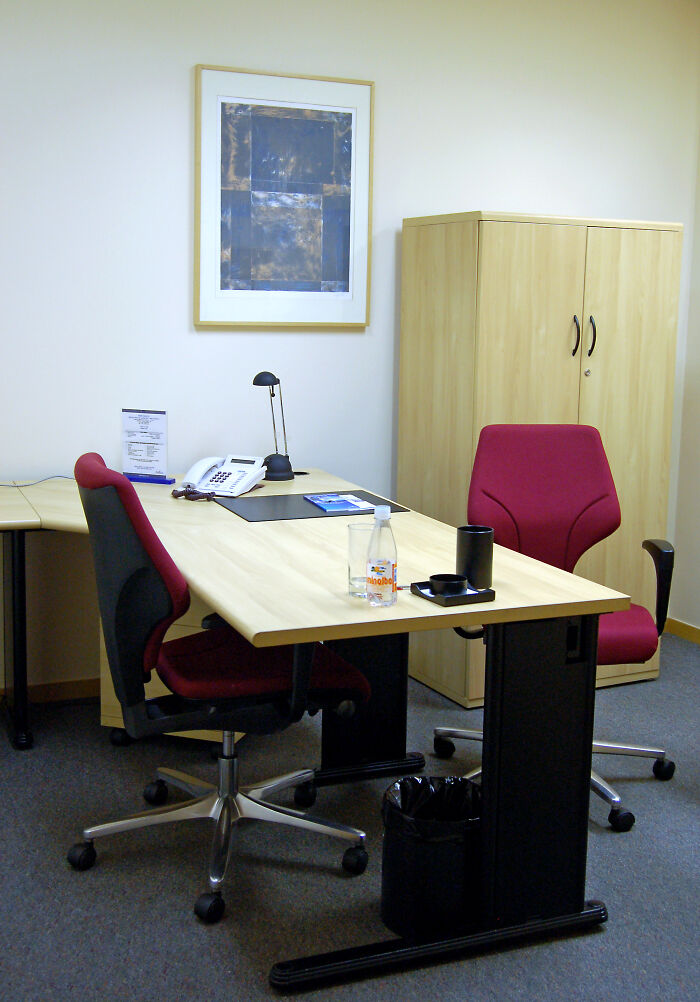 Office workspace with chairs and desk, illustrating specific little things that are so irritating in everyday environments.