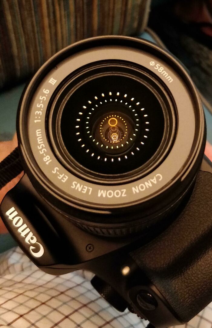 This Ceiling Light Reflection On My Camera Lens