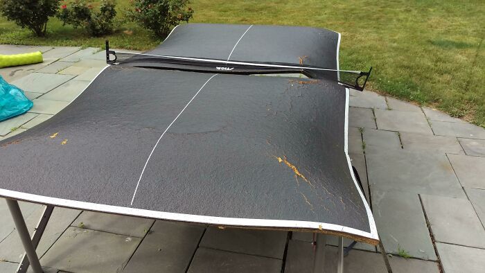 Ping Pong Table Left Outside In The Rain