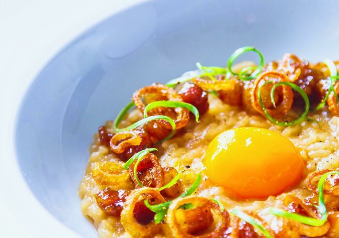 Caramelized Pork Belly, Crispy Shallots, Scallions, Sous Vide Egg Yolk, Risotto