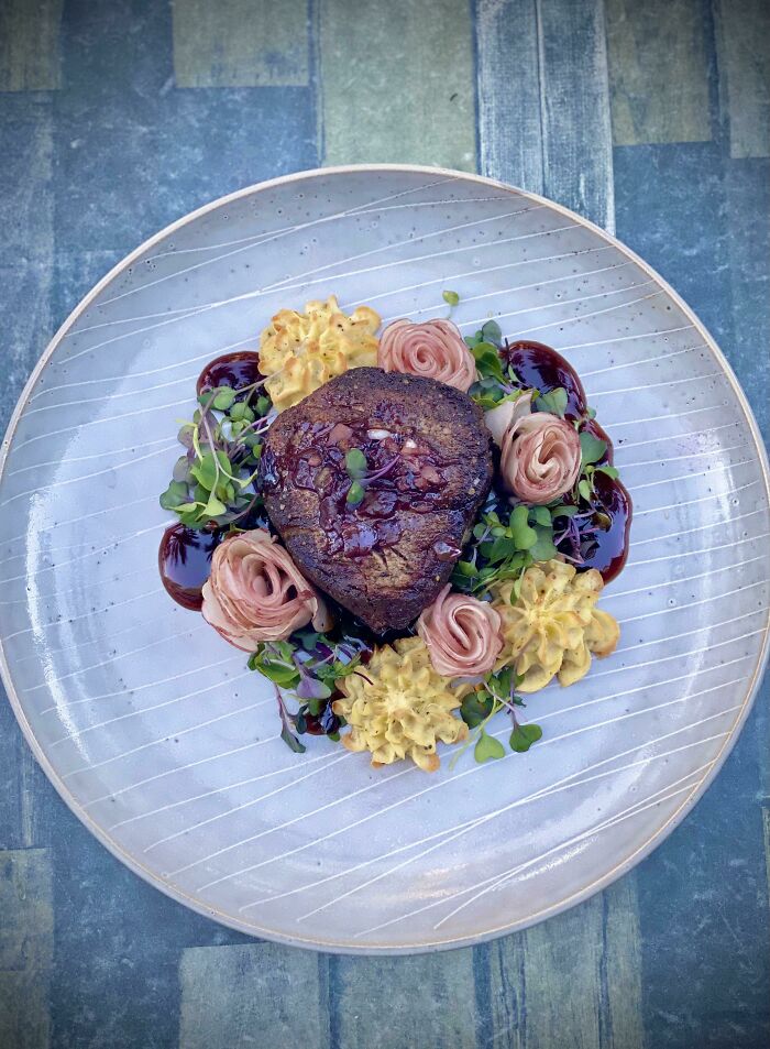 Seared Filet, Truffle Duchess Potatoes, Pink Fingerling Roses, Red Wine Pan Sauce, Fresh Micros.