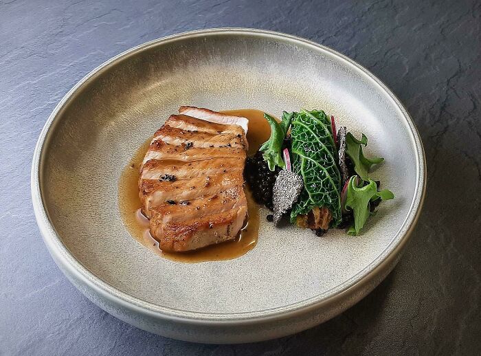 Roasted Pork Chop With Lentils, Cabbage Roll And Chia Chips