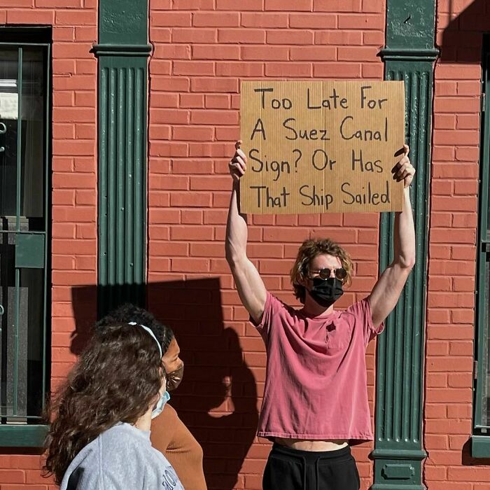 Dude-Holding-Signs-Protesting