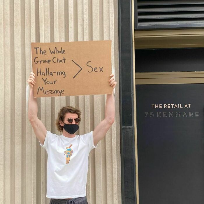Dude-Holding-Signs-Protesting