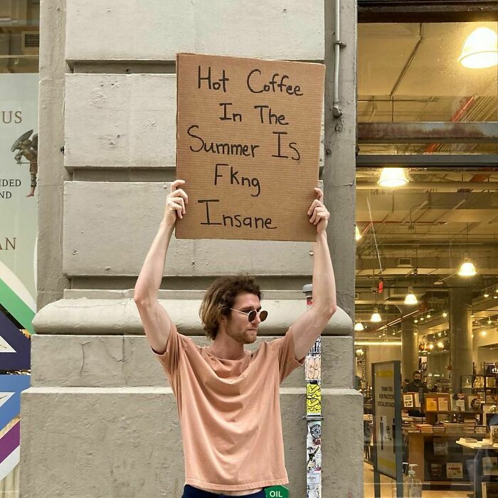 Dude-Holding-Signs-Protesting