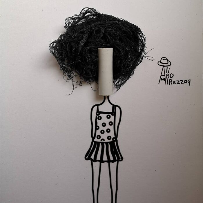 Interactive illustration featuring a drawn figure using a chalk piece and black thread as hair with everyday items.